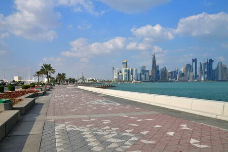 Doha, Qatar - Nov 21. 2019. Corniche Waterfront is popular place for walking tourists and Qatariのeditorial素材