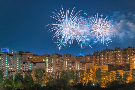 Fireworks over houses in residential area of Moscow. Russia