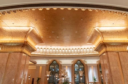Abu Dhabi, UAE - March 30. 2019. Golden interior of the Emirates Palace - luxury hotelのeditorial素材