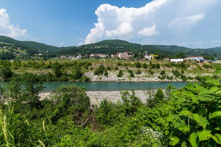 Rural landscape with mountains and the houses in Zabljak Municipality, Montenegroの写真素材
