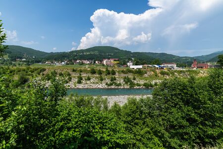 Rural landscape with mountains and the houses in Zabljak Municipality, Montenegroの写真素材