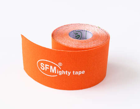 Berlin, Germany - March 15. 2020. Orange sports medical tape of a SFM Hospital Products GmbHのeditorial素材