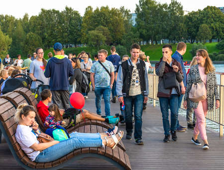 Moscow, Russia - Sept 7. 2019. People sit on benches during the celebration of Victory Day in a park in Zelenogradのeditorial素材