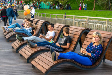 Moscow, Russia - Sept 7. 2019. People sit on benches during the celebration of Victory Day in a park in Zelenogradのeditorial素材