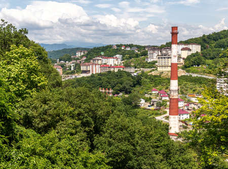 Sochi, Russia - June 5. 2018. Cityscape with pipe and mountainのeditorial素材
