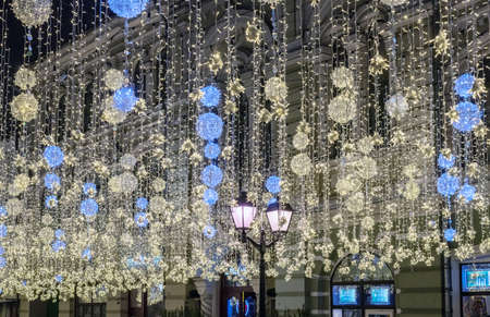 Moscow, Russia - Jan 2. 2019 Glowing decorations onNikolskaya - pedestrian street in city centerのeditorial素材