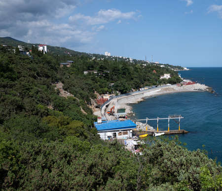 Simeiz, Crimea - July 1, 2019. The Coastline with a popular beachのeditorial素材