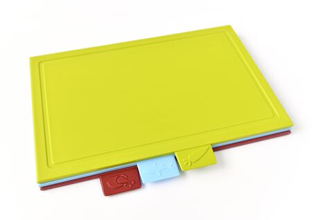 Colored plastic cutting boards on light backgroundの写真素材