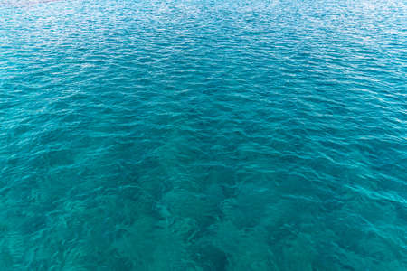 Beautiful background with sea water. Surface of the mediterranean seaの写真素材