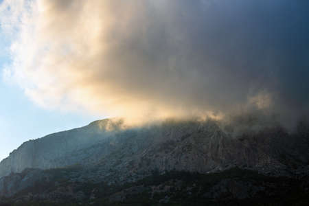 Beautiful clouds on top of a mountain in Crimeaの写真素材
