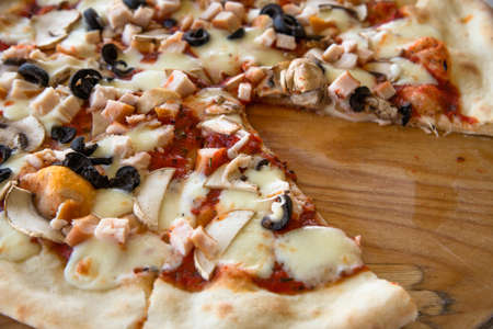 The Pizza with olives and a mushroomsの写真素材