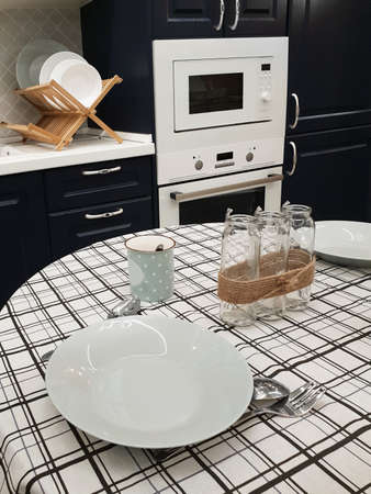 Fragment of kitchen interior with dining tableの写真素材