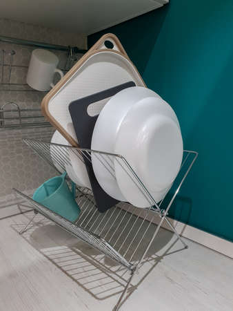 The Metal dish rack in the kitchenの写真素材
