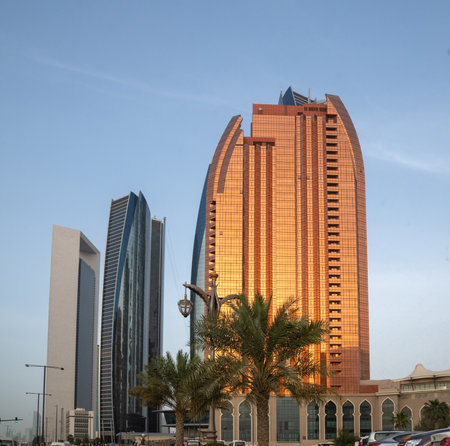 Abu Dhabi, UAE - March 31. 2019. The Etihad Towers and Bab Al Qasr Hotel On the Sunsetのeditorial素材
