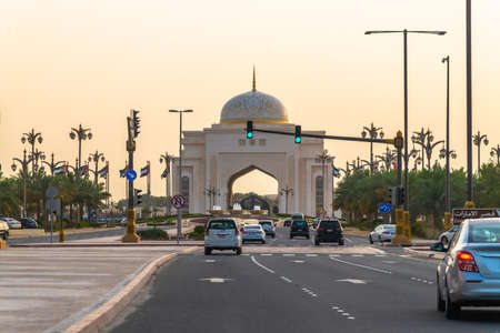 Abu Dhabi, UAE - March 31. 2019. The Arch main entrance to Presidential Palace On the Sunsetのeditorial素材