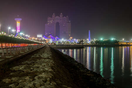 Abu Dhabi, UAE - April 4. 2019. Fairmont Marina Abu Dhabi hotel in the nightのeditorial素材