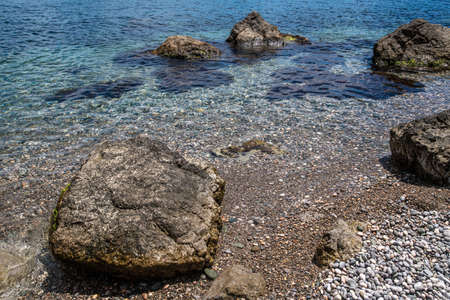 seascape with stones on the shore in Crimeaの写真素材