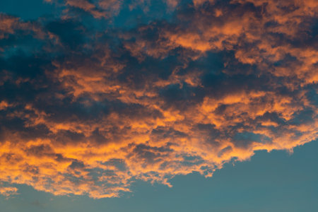 Beautiful sky landscape with yellow clouds at sunsetの写真素材
