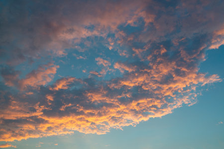 Beautiful sky landscape with yellow clouds at sunsetの写真素材