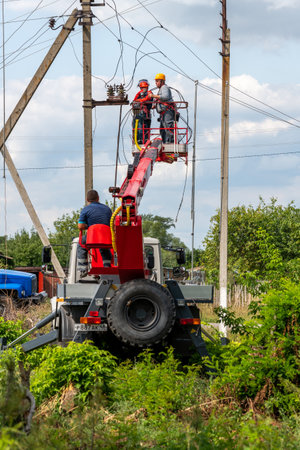 Gryazi, Russia - Aug 23. 2021. Electricians work of Rosseti is the largest energy company in Russia and the worldのeditorial素材