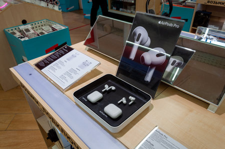 Moscow, Russia - Okt 15. 2021. Headphones AirPods and AirPods pro in MVideo store - the largest seller of electronicsのeditorial素材