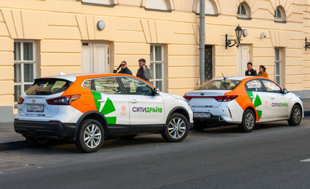 Moscow, Russia - Okt 15. 2021. Moscow Car Sharing Car - the City Drive on streetのeditorial素材