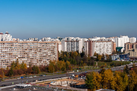Moscow, Russia - Oct 5. 2021. Panoramic view of the city - residential buildings, road and shopping centerのeditorial素材