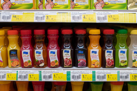Ajman, UAE - April 6. 2018. The Plastic bottles with juice in grocery store in the emirate of Ajmanのeditorial素材