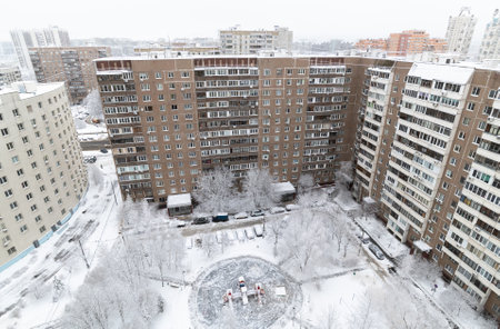 Yard with playground during heavy snow in Russia. Top viewの写真素材