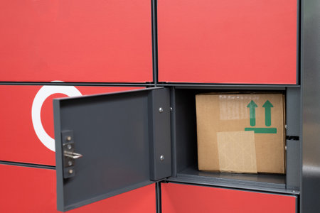 cardboard parcel in a cell postamatの写真素材
