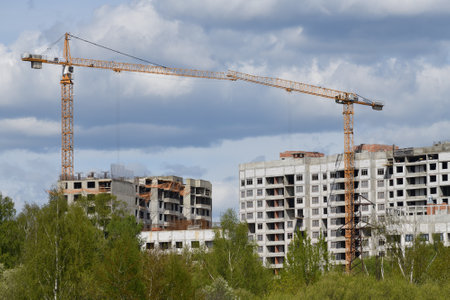Moscow, Russia - 4 May.2023. Liebherr cranes build residential buildingsのeditorial素材