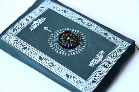 Portable Islamic Prayer Mat with Compass to Point to Meccaの写真素材