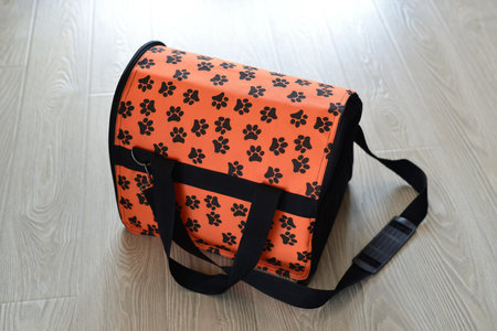 Pet carrier bag on the floorの写真素材