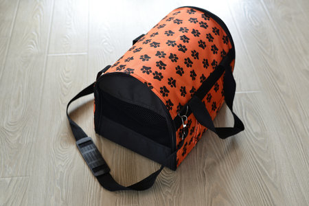 Pet carrier bag on the floorの写真素材