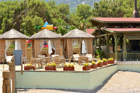 Kemer, Turkey - 06. 21.2014. Empty cafe and gazebos for relaxing on beachの写真素材
