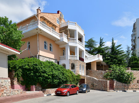 Foros. Crimea - June 28. 2019. Smotrych - private mini hotel, typical Crimean architectureの写真素材