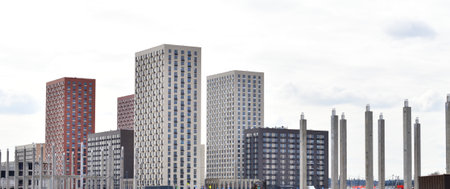Concrete piles against background of new buildingsの写真素材