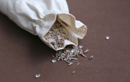 Lavender seeds in handmade fabric bag and bath saltの写真素材