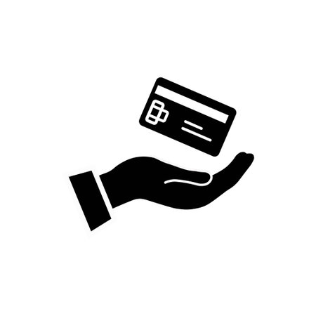 Credit card payment icon. Contactless payments. Hand holding credit card black icon vector illustrationのイラスト素材