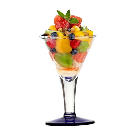 ice cream dessert with whipped cream and fruit on a white backgroundの写真素材