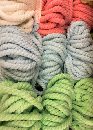 Balls of wool pink and white colors. The concept is a hobby - knitting. Fun doing handmadeの写真素材