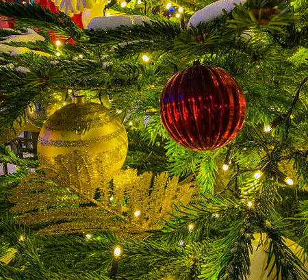 Preparations for the celebration of Christmas with evening light. Decorations on the Christmas tree. World of beautyの写真素材