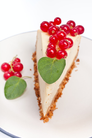 cheesecake with redberries and mint leavesの写真素材