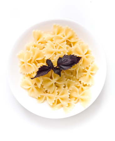 bowl of fresh plain farfalle pastaの写真素材