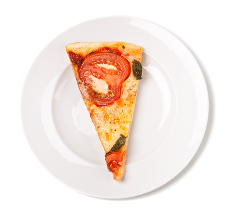 piece of pizza margharita on a white plateの写真素材