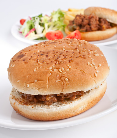 two minced meat burgers and saladの写真素材
