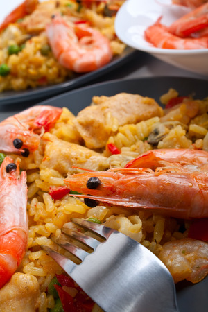 two servings of traditional spanish paellaの写真素材