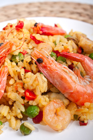 serving of spanish paellaの写真素材
