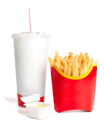 French fries with cheese sauce and a large drinkの写真素材