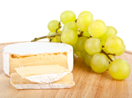 brie cheese with white grapesの写真素材